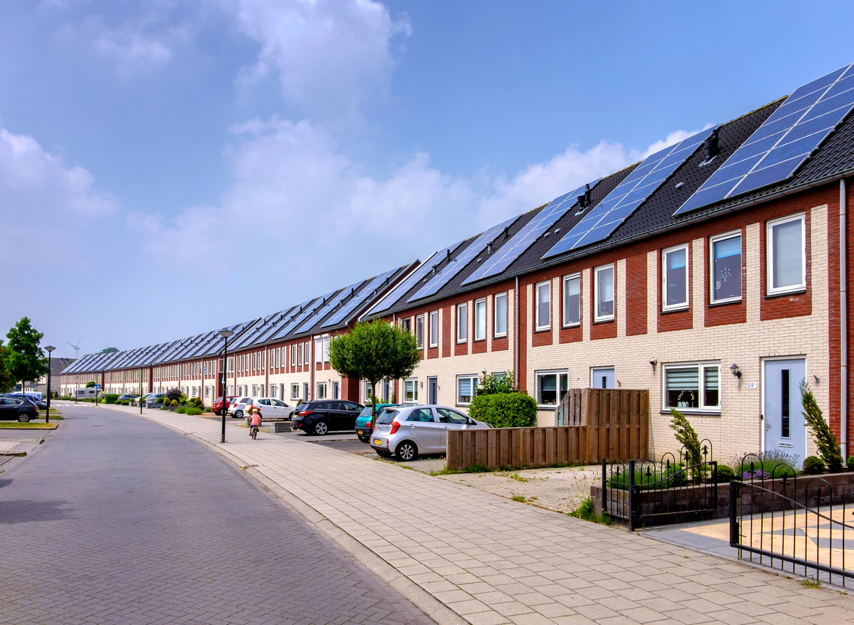 Row of houses with solar panels on the roof